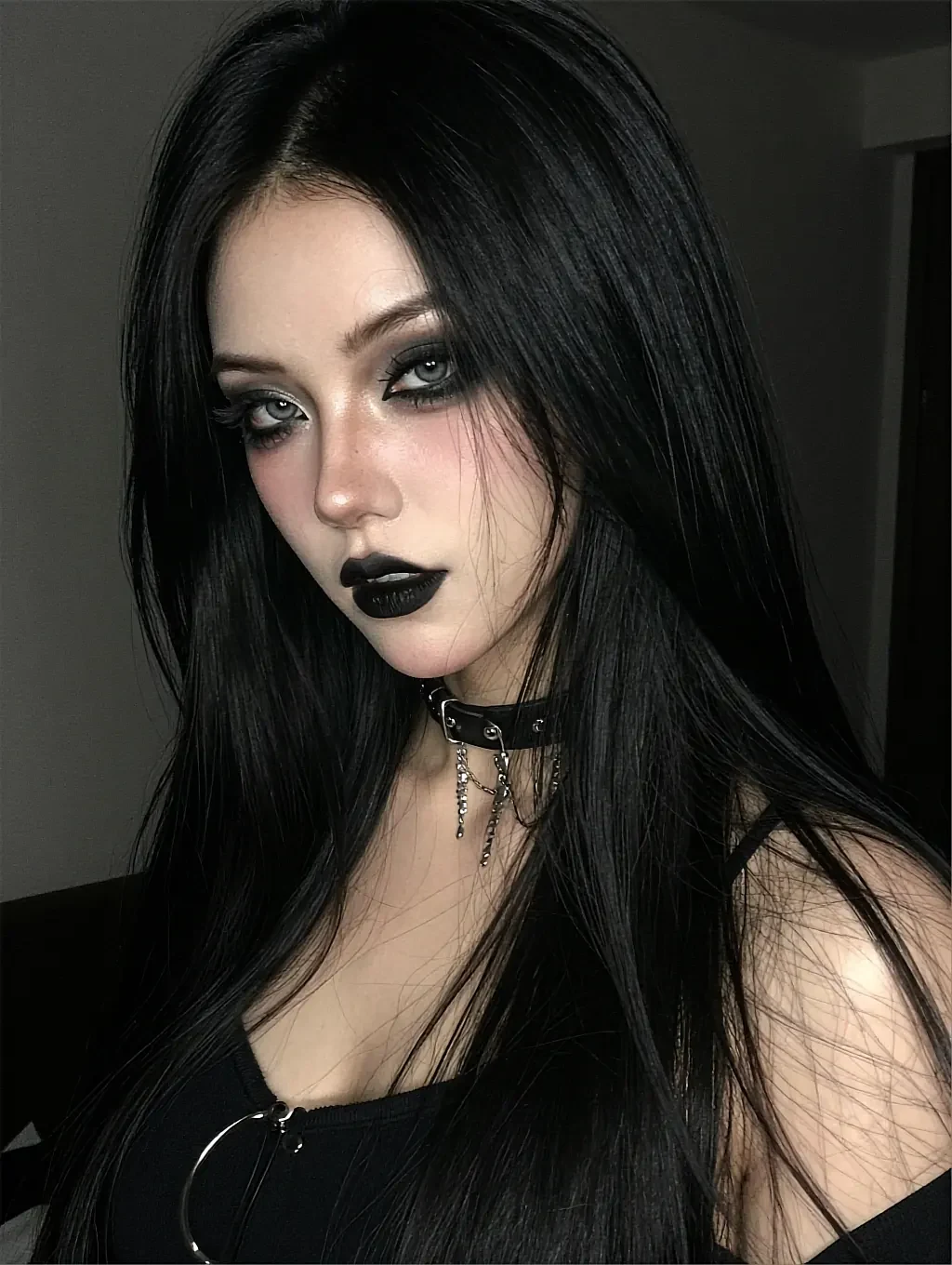 Fictional AI character with black lipstick and a studded choker indoors